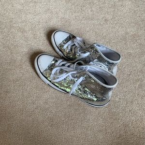 Silver sequin chucks.